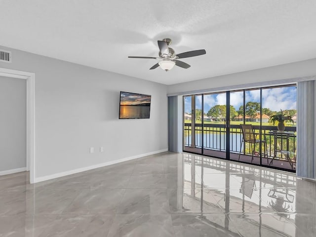 empty room with ceiling fan