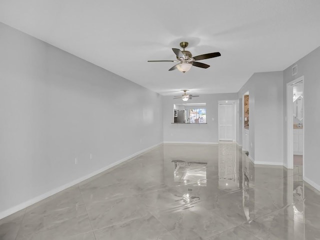 unfurnished room with ceiling fan