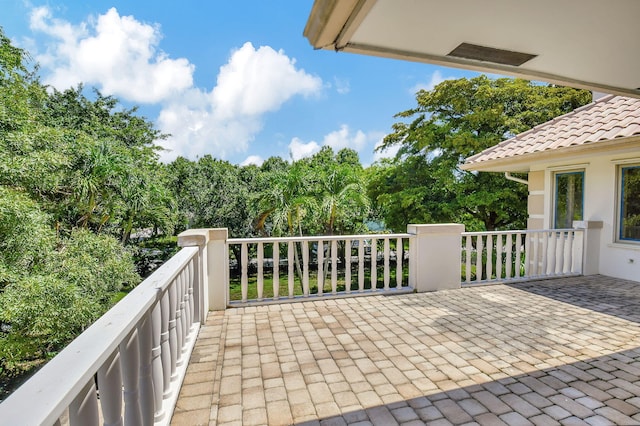 view of patio with a balcony