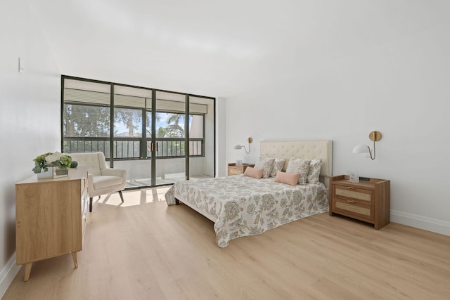 bedroom with light hardwood / wood-style floors