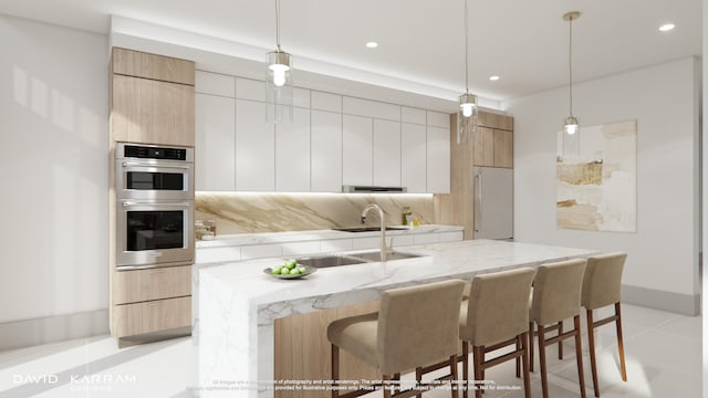 kitchen featuring white cabinets, stainless steel double oven, and decorative light fixtures