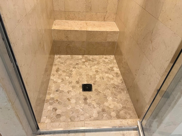 details featuring a tile shower