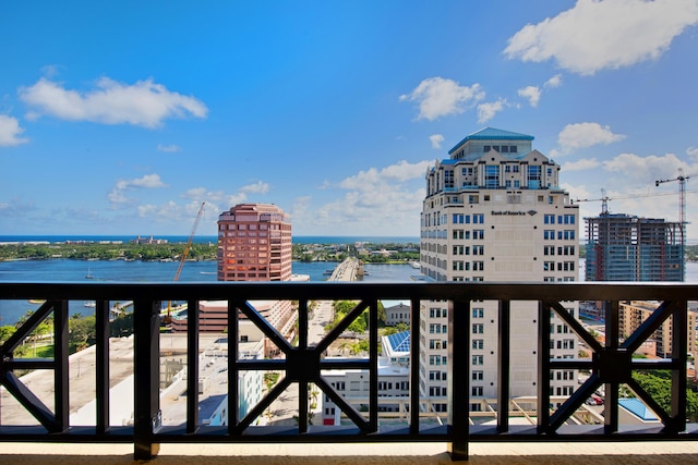 balcony featuring a water view