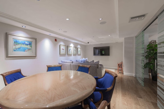 dining room with hardwood / wood-style floors