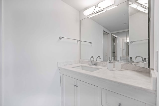 bathroom featuring large vanity