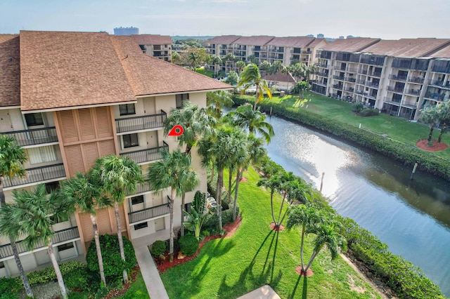 view of building exterior featuring a water view