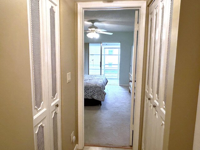 full bathroom with combined bath / shower with glass door, tile floors, large vanity, and toilet