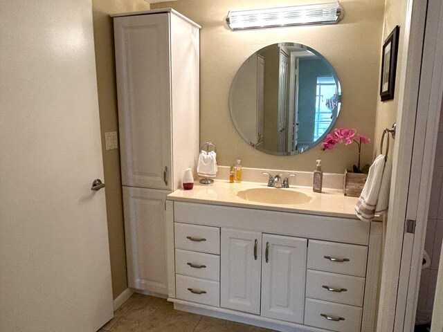 walk in closet featuring tile floors