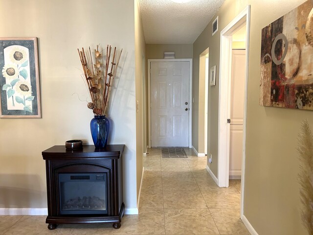 dining space with a notable chandelier and light tile flooring