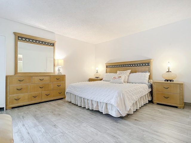 bedroom featuring light hardwood / wood-style floors