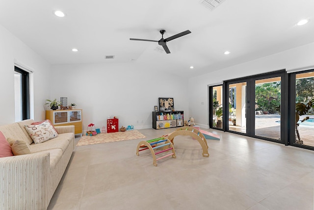 recreation room featuring french doors, ceiling fan, and lofted ceiling