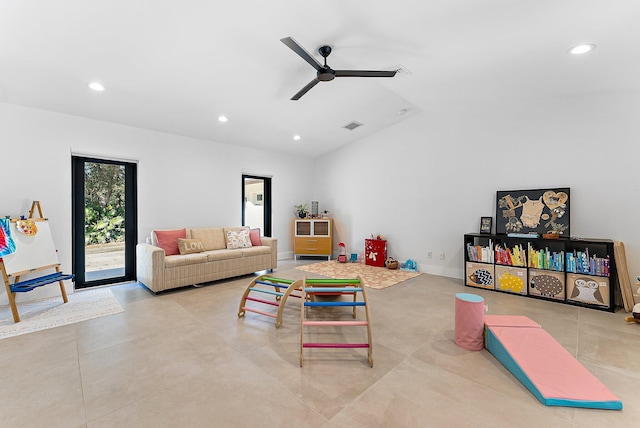 living room with ceiling fan and lofted ceiling