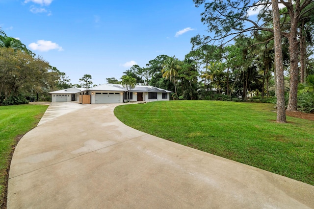 ranch-style home with a front lawn and a garage