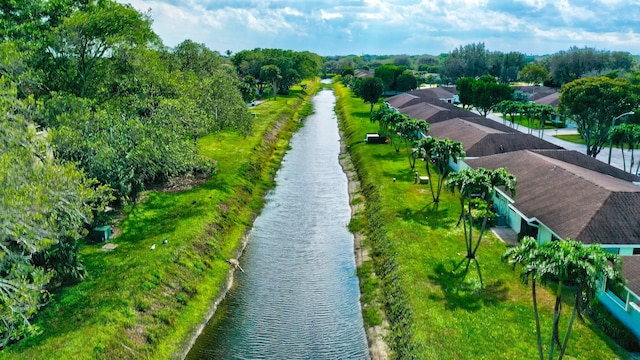 bird's eye view with a water view