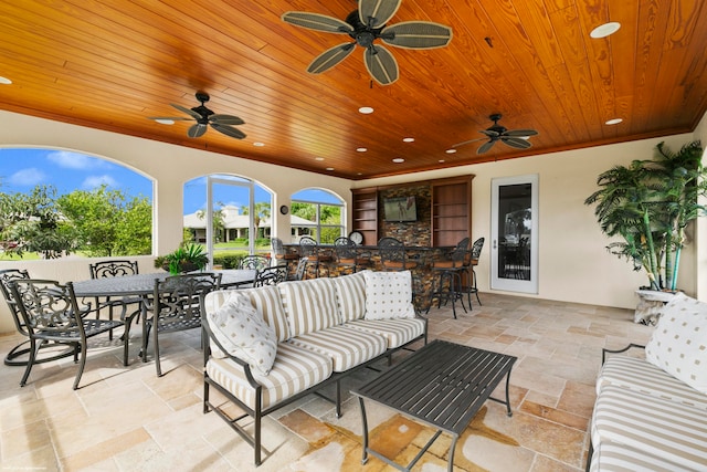 view of terrace featuring an outdoor hangout area and ceiling fan