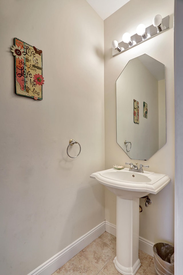 bathroom featuring sink and tile patterned flooring