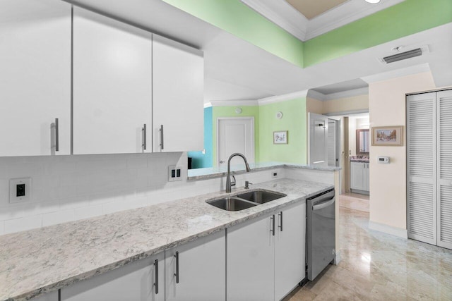 kitchen featuring light stone countertops, white cabinets, crown molding, sink, and dishwasher