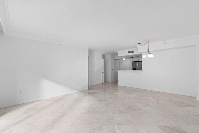 unfurnished living room featuring crown molding