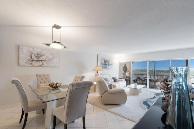 dining room featuring light tile floors