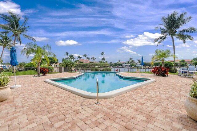 view of pool featuring a patio