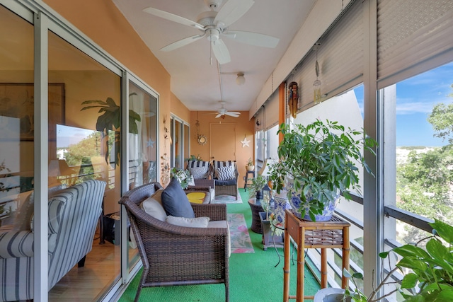 sunroom / solarium with ceiling fan