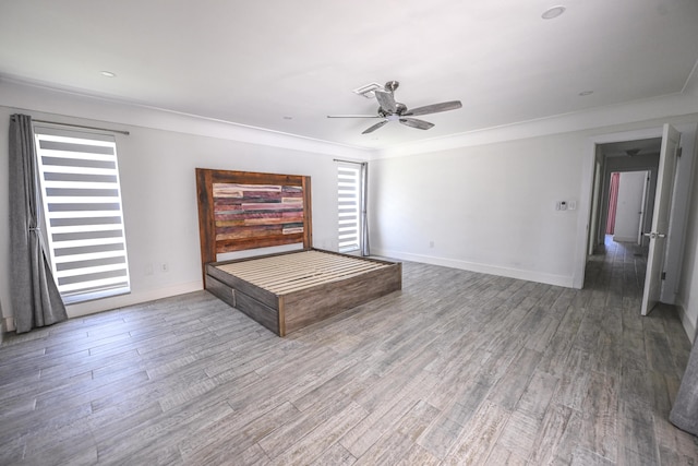 9010 S Lake Dasha Dr, Plantation, FL 33324 - unfurnished living room featuring ceiling fan, wood finished floors, baseboards, and ornamental molding