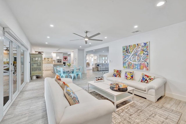 living room with ceiling fan