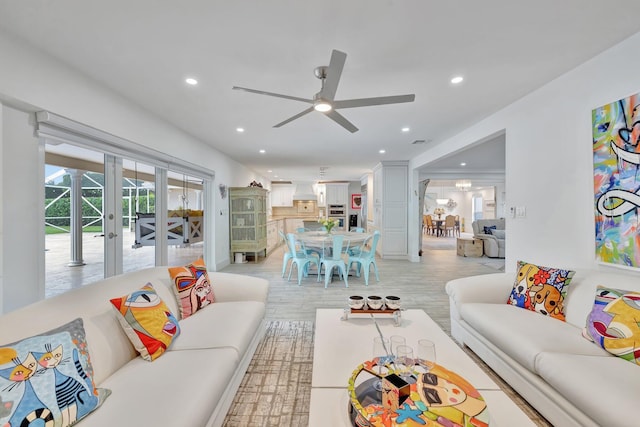 9010 S Lake Dasha Dr, Plantation, FL 33324 - living area featuring recessed lighting, a ceiling fan, and light wood-style flooring