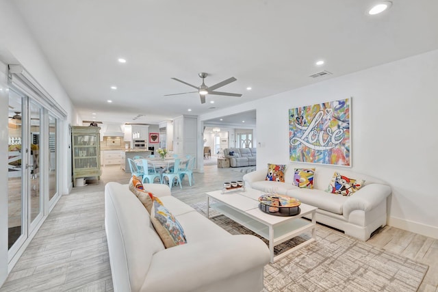 9010 S Lake Dasha Dr, Plantation, FL 33324 - living area featuring ceiling fan, recessed lighting, light wood-type flooring, baseboards, and french doors