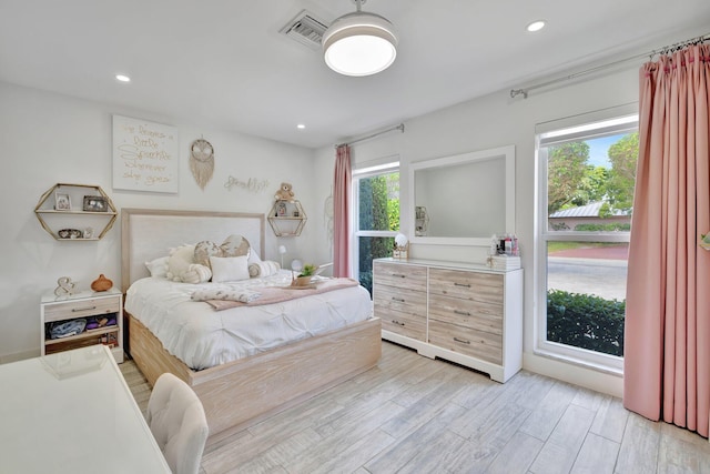 9010 S Lake Dasha Dr, Plantation, FL 33324 - bedroom with light wood finished floors and recessed lighting