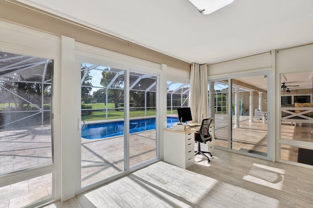 9010 S Lake Dasha Dr, Plantation, FL 33324 - unfurnished sunroom featuring plenty of natural light, a pool, and ceiling fan