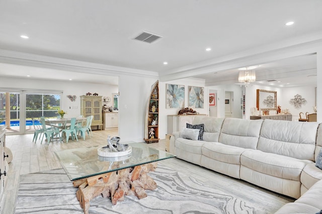 9010 S Lake Dasha Dr, Plantation, FL 33324 - living room featuring ornamental molding, recessed lighting, wood finished floors, and a chandelier