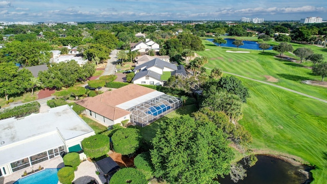 9010 S Lake Dasha Dr, Plantation, FL 33324 - aerial perspective of suburban area featuring a golf club, a large body of water, a tree filled landscape, and a pool