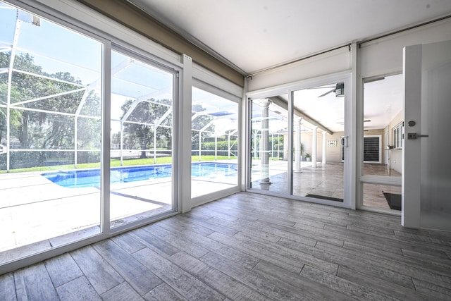 9010 S Lake Dasha Dr, Plantation, FL 33324 - unfurnished sunroom with a ceiling fan and healthy amount of natural light
