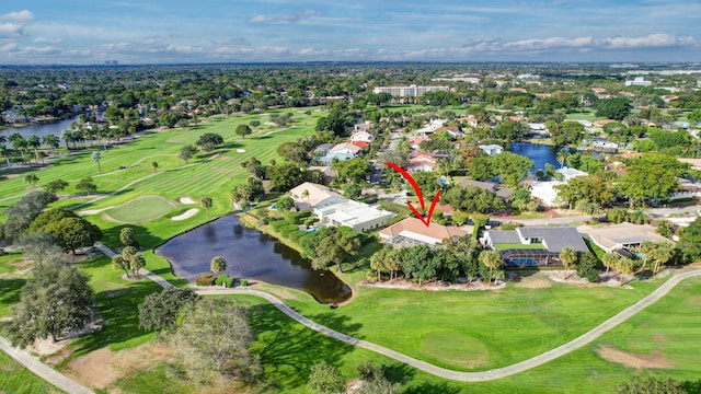 9010 S Lake Dasha Dr, Plantation, FL 33324 - aerial view of property's location featuring a nearby body of water, a golf course, and nearby suburban area