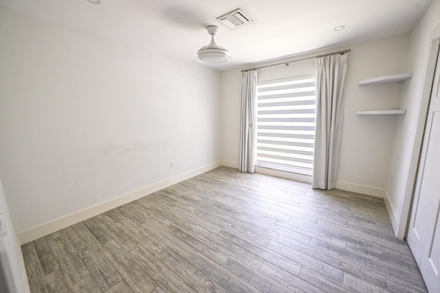 9010 S Lake Dasha Dr, Plantation, FL 33324 - unfurnished room featuring wood finished floors and baseboards