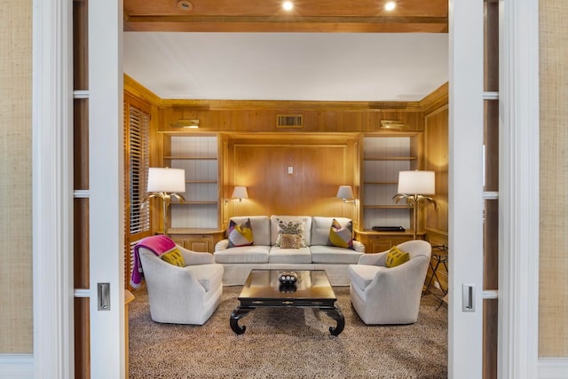 living room featuring wood walls