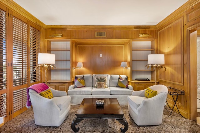 living room with wooden walls and light colored carpet