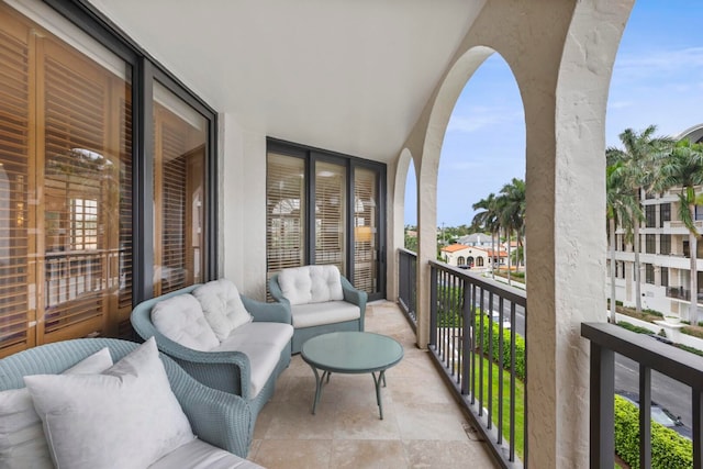 balcony featuring a sunroom