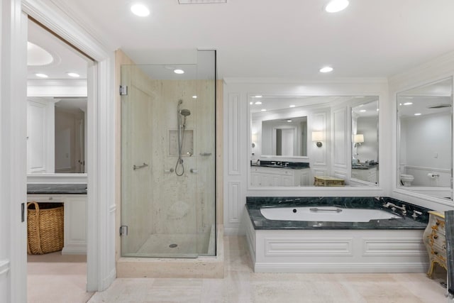 full bathroom with recessed lighting, a garden tub, ornamental molding, and a shower stall