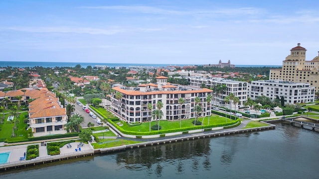 birds eye view of property featuring a water view