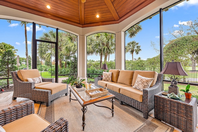 sunroom with wooden ceiling