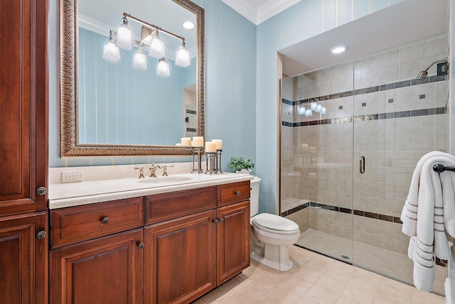 bathroom with an enclosed shower, vanity, tile floors, and crown molding