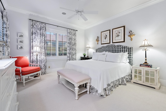 bedroom with light carpet, crown molding, and ceiling fan