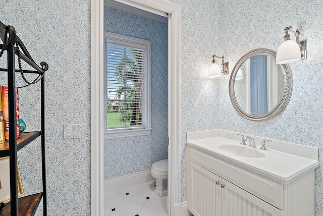 bathroom featuring toilet, tile flooring, and oversized vanity