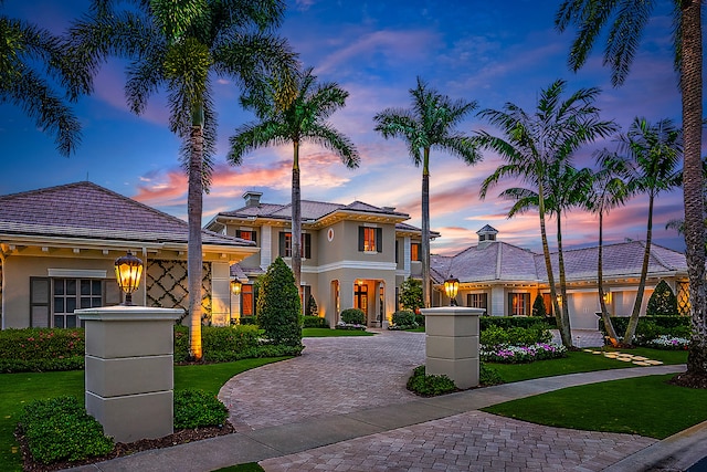 view of front of house with a yard