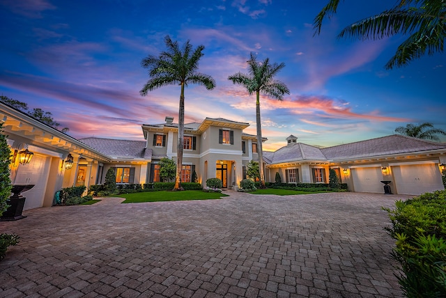 view of front of property with a garage