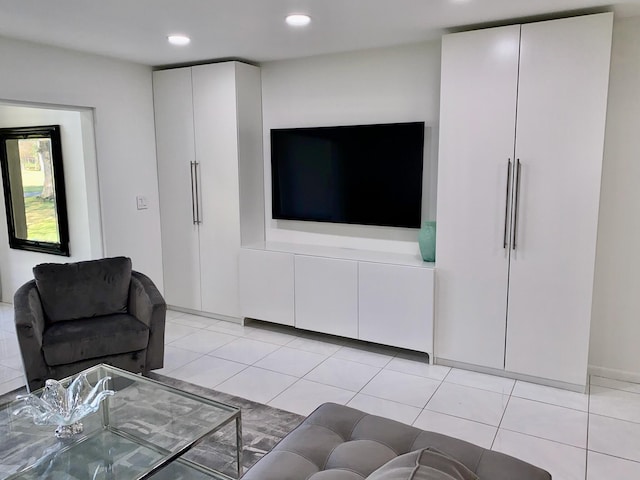 living room featuring light tile flooring