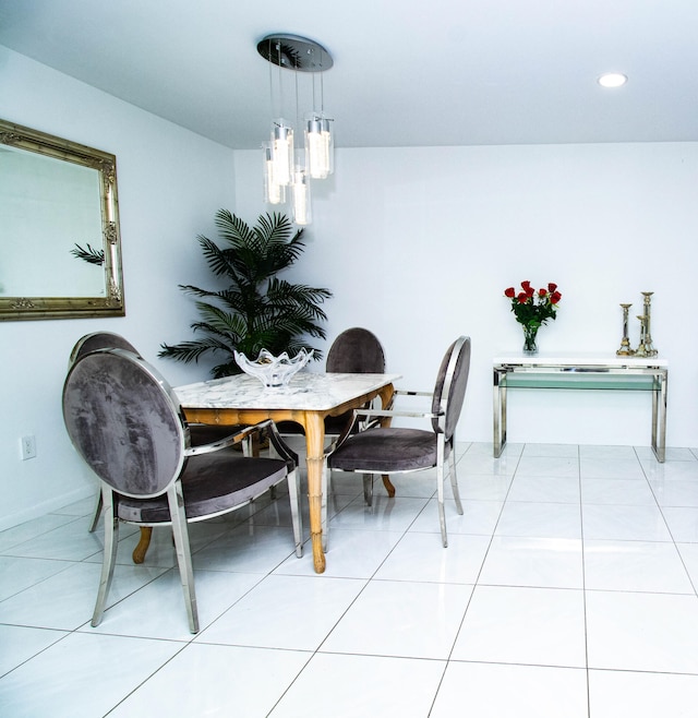 dining room featuring light tile floors