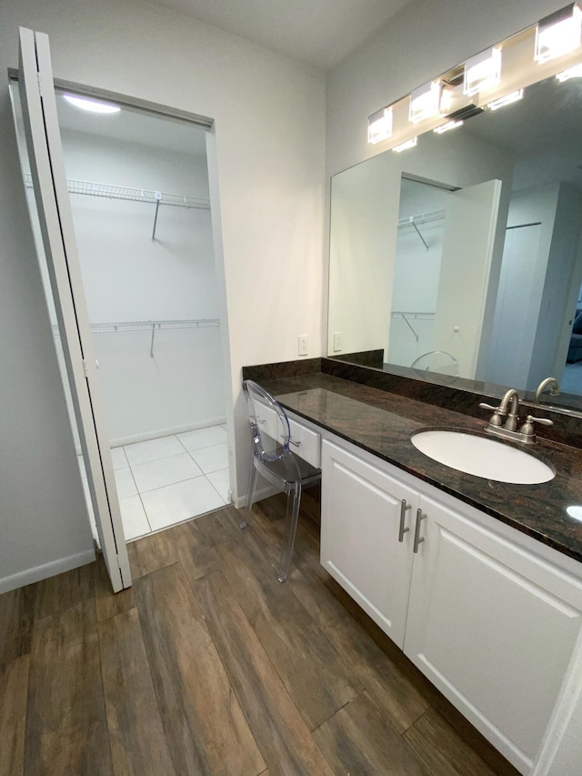 bathroom featuring vanity and tile flooring